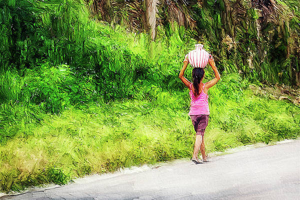 Girl carrying water home, Guatemala